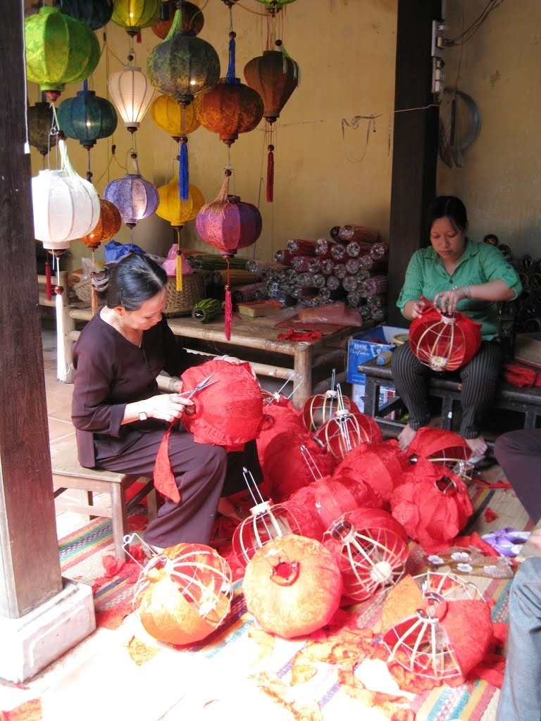 The lanterns feature Hoi City 